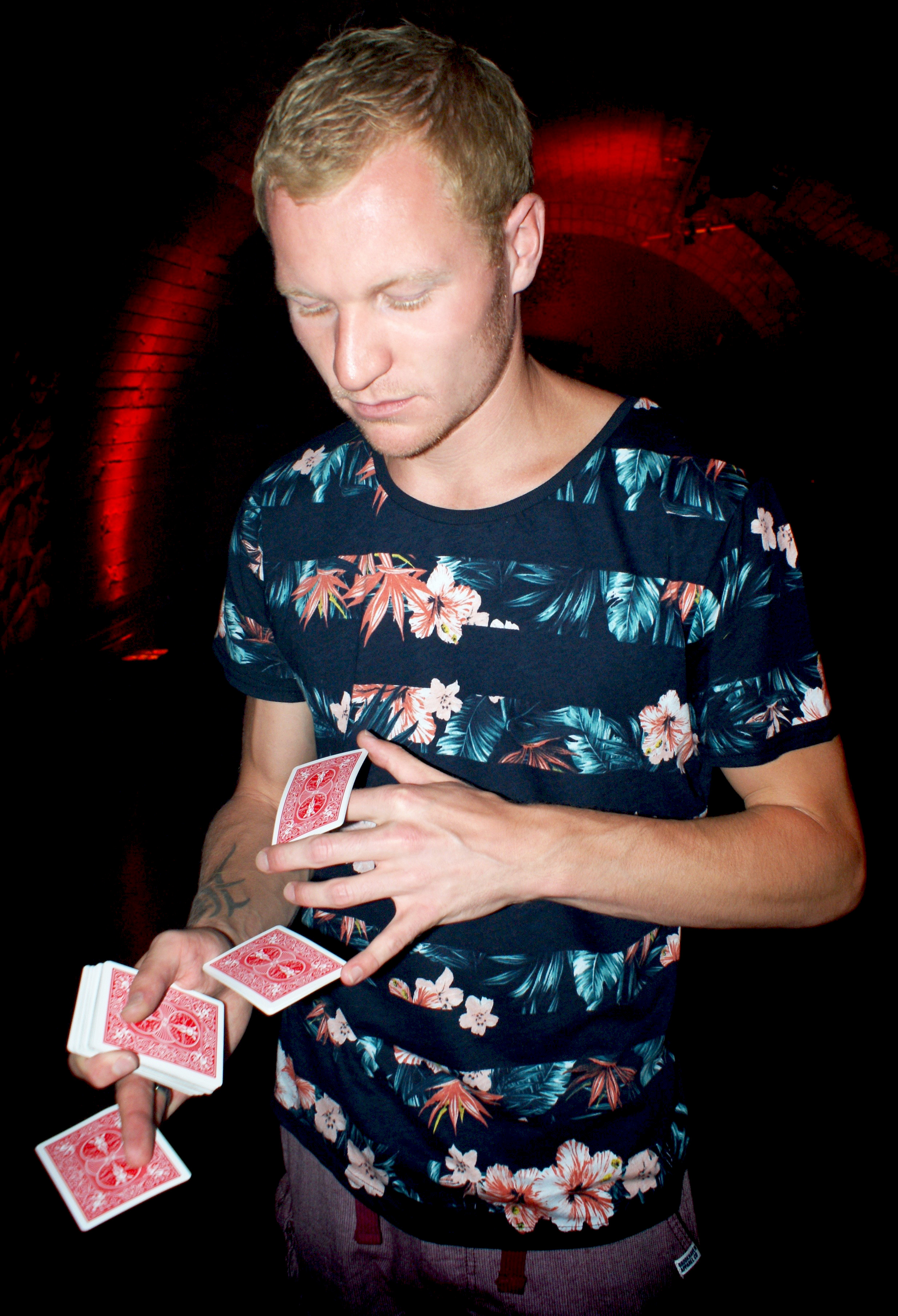 Street Magician Liam Walsh performing close up magic for Virgin Media Party in London